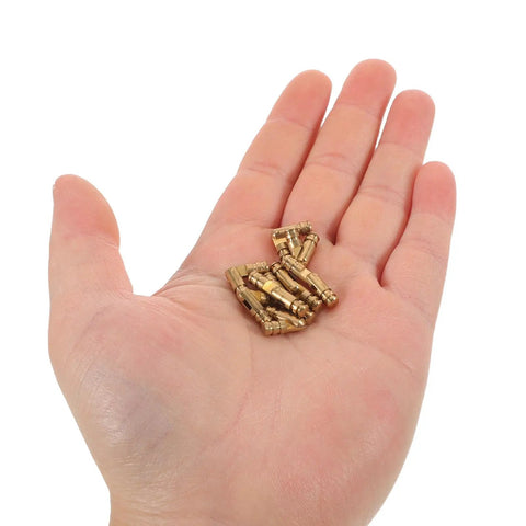 Hand holding 25 Piece Brass Invisible Barrel Hinge Set For Jewelry Boxes And Wooden Cabinets With Concealed Silent Opening Mechanism