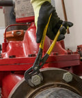 Worker using 12 Inch Quick Adjust Pump Pliers With Tongue And Groove Klaw Push Button Ratchet For Fast Adjustments on a red valve