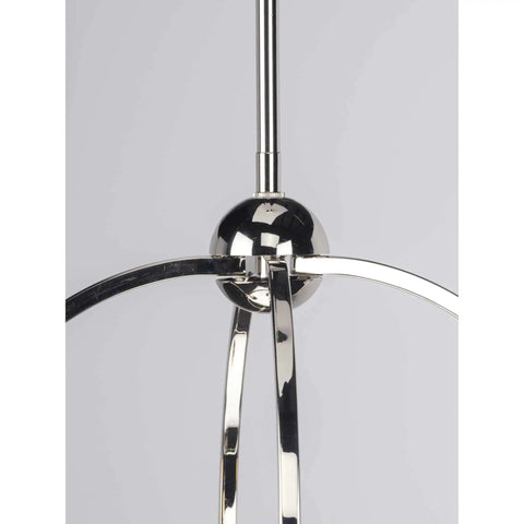 Close-up of the orb and curved arms on Three Light Polished Chrome Coastal Pendant Light with Clear Glass Shades for Entryways and Kitchen Islands