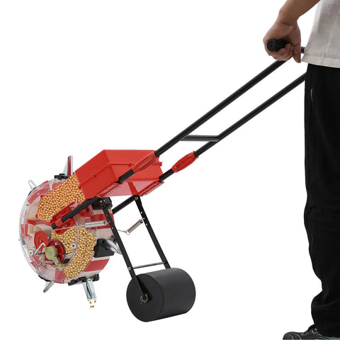Person using Handy Manual Seeder With Seven Nozzles And A Smooth Hand Push Roller For Garden Planting Soy Peanut Corn Cotton Soybean Depth 1.38-3.07 in