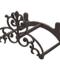 Brown Heavy Duty Cast Iron Outdoor Garden Hose Hanger With Wall Mount Water Hose Holder Reel Vintage Scrollwork Design No Fuss Sturdy And Built To Last For Fifty To One Hundred Feet Of Hose, front view.