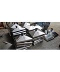 Heavy Duty Stainless Steel Fume Extraction Hood For Welding Cutting Dust Capture Industrial Air Filtration System Built Tough Smooth Airflow Design stacked in a workshop.