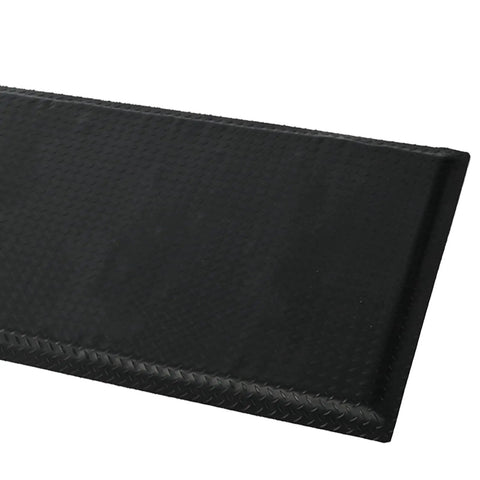 Close-up of 3 By 7 Foot Anti Fatigue Floor Mat Extra Thick One Inch For Machinist Shop Garage Standing Pad With Anti Static Rubber Top EPDM Foam Core And Conductive Bottom To Reduce Foot And Leg Fatigue Black