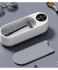 This Slick Little Ultrasonic Cleaner Machine Packs A Serious Punch With A Roomy 300 ML Tank for cleaning jewelry and gadgets.