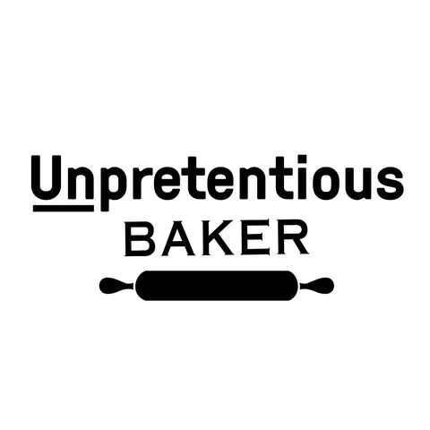 Logo for Unpretentious Baker with a rolling pin graphic.