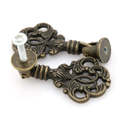 Vintage Pendant Pull Handles Set Of 4 In Distressed Antique Brass, zinc alloy pulls with entangled leaves and round base, close-up view