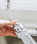 Hand adjusting Faucet Extender Kitchen Sprayer Attachment 360 Degree Rotatable No Splash Water Saving Tap in use