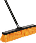Real Deal Heavy Duty Push Broom With Long Handle Made To Crush Daily Grime On Smooth Floors Sweeps Sand Mud Leaves And Water Easy Without Breaking A Sweat In Bright Yellow 18 Inches Wide angled view of a heavy duty push broom with orange bristles.