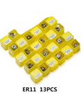 Top Tier Spring Collet Set For CNC Lathe And Milling Machine Includes ER8 ER11 ER16 ER20 ER25 ER32 Sizes With 0.015mm Precision Grip in yellow holder.