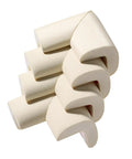 Four Pack Top Tier Baby Proofing Corner Guards With Soft Nbr Rubber Foam And No Sweat Self Stick Backing For Heavy Duty Furniture Edge Safety In Cool Off White stacked and angled view.