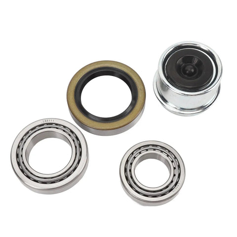 Trailer Wheel Hub Bearing Kit 7-Piece With L68149 L44649 Bearings, 171255TB Seal, Dust Cap, Cotter Pin For 3500 Pound Axles And 1-1/16 In To 3/8 In Spindle, Complete Replacement Set For Easy, Durable Install parts laying on a white background.