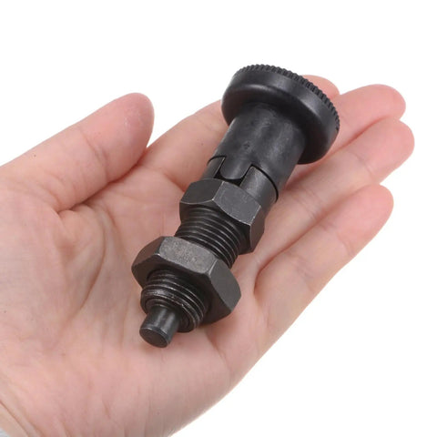 M16x1.5 Push Fit Ball Nose Spring Plunger With 8mm Pin And 1.02 Inch Thread held in hand, showcasing solid carbon steel finish.
