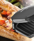 Compact Space Saver Two Serving Grill And Panini Press for Dorm Rooms and Small Kitchens shown open with sandwich