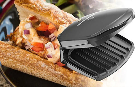 Compact Space Saver Two Serving Grill And Panini Press for Dorm Rooms and Small Kitchens shown open with sandwich