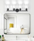 4 Light Vanity Lights Black Wall Sconce With Clear Glass Over Mirror in modern bathroom setup