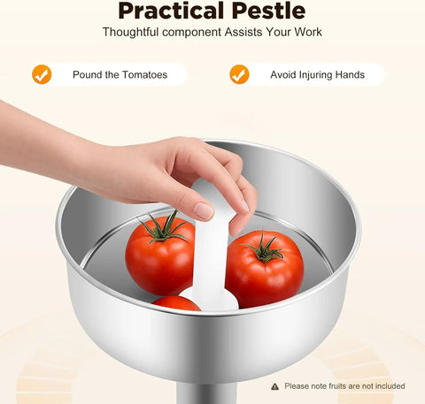 Heavy Duty Electric Tomato Sauce Maker And Fruit Strainer with pestle pressing red tomatoes in stainless steel funnel.