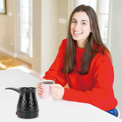 Woman with Portable Turkish Coffee Pot 600ml Electric Kettle With Removable Anti Scald Handle For Heating Coffee Tea Milk