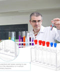 Scientist using Clear Plastic Test Tube Rack For Lab And Classroom Use Holds Multiple Tubes With Color Caps, Durable Stand