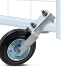 Gate Support Wheel For Metal Tube Gates Six Inch Heavy Duty Farm Caster attached to metal gate frame