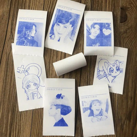 Twenty Pack Square Thermal Receipt Paper For Mini Pos Printers Self Adhesive Photo Sticker Rolls Lowkey Perfect For Quick Sales And Everyday Retail Setup That Really Hits Different with images printed on the thermal paper.