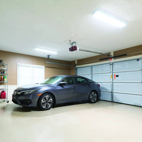 Two Foot LED Wraparound Ceiling Light Fixture That Really Pops Low Profile Flush Mount 4000K Cool White 120V 24 Inch Ultra Bright Daylight Vibe For Office Closet Garage And More installed in a garage.