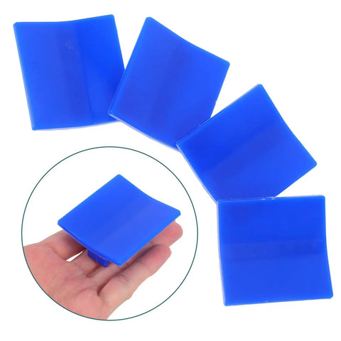 4 Piece Auto Dent Repair Kit With Plastic Puller Tabs shown in blue, hand holding one tab.