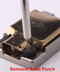 Removal rivet punch pressing against a pocket lighter, part of the Complete 5 Piece Lighter Repair Tool Kit With Heavy Duty Steel Wheel Rivet Punch Set And Secure Fix Base For Inner Liner Restoration Badass Fix Gear For Everyday Carry Crew.