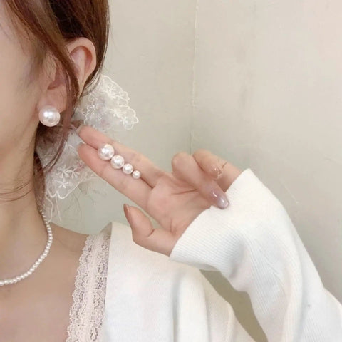 Hypoallergenic Pearl Stud Earrings Set For Women, 12 Pairs With 4 Size Options, Stainless Steel Lightweight Imitation Pearl Studs, Comfortable Daily Wear For Sensitive Skin, Simple Elegant Round Pearl Jewelry For Everyday Chic. worn on ear