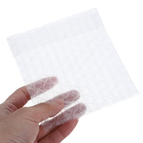 Close-up of Fifty Pack Small Bubble Mailers 10x10 Plus 3cm Self Seal Padded Envelopes showing bubble wrap texture and size