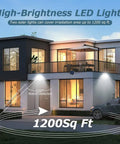 Outdoor Solar Motion Sensor Lights Bangin With 56 LED Dual Lamps illuminating modern house at night