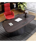 Rock Solid Adjustable Sit Stand Desk With Integrated Charging Outlets And Sculpted Wave Base For Heavy Duty Home Office and Ultimate Pro Gaming Workspace, top view with red chair.