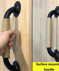 Industrial Style Wrought Iron Cabinet And Barn Door Handles With Hemp Rope Pulls, mounted on a wooden surface