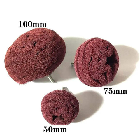 Three red non-woven abrasive mushroom buffs of various sizes from the 7 Piece Red Non Woven Abrasive Drill Buffing Attachment Set with One Quarter Inch Shank.
