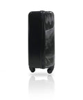 Side view of 20 inch kids dinosaur carry on luggage with Jurassic World graphics and durable spinner wheels for easy travel.