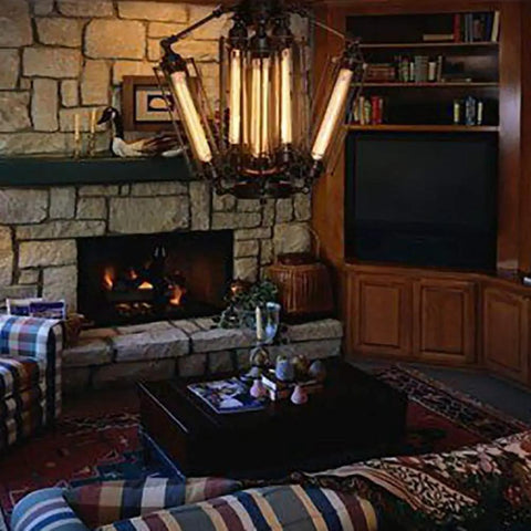 Living room with Dimmable T10 LED Filament Tubular Bulb 6W Warm White 2700K in chandelier over stone fireplace and furniture