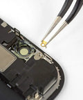 Placing component in device using Essential Electronics Toolkit for DIY Home and Tech Repairs with Magnetic Bit Screwdriver