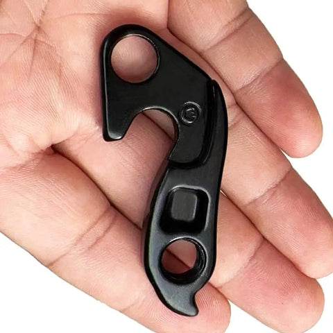 Black beefy rear derailleur hanger 11 replacement for select road and gravel bikes, CNC machined alloy, in hand view, part 9893-4291