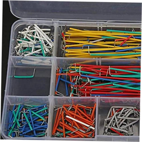 Complete Breadboard Jumper Wire Kit With 560 Piece Solderless Cables In Multicolored Assorted Lengths showing organized wires in a storage box.