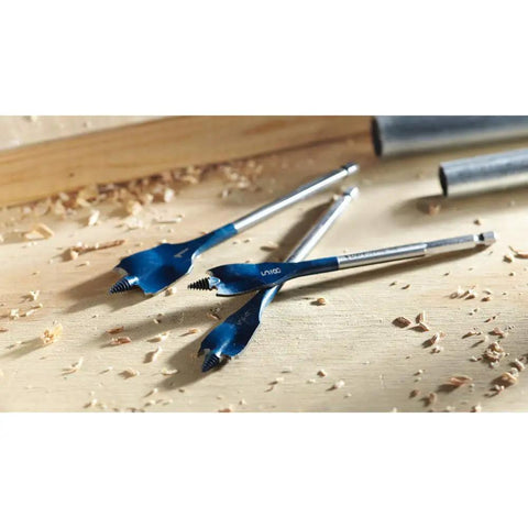 Two spade bits from 12 Piece Daredevil Spade Bit Set With One Quarter Inch Hex Shank For Fast Wood Drilling on wooden surface