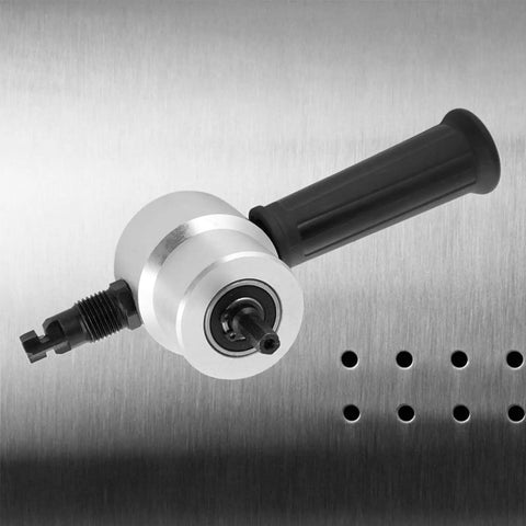 Close-up of Dual Head Sheet Metal Nibbler Saw Cutter with 360 Degree Rotation for Electric And Pneumatic Drills on metal surface.