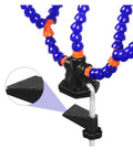 Close-up of Third Hand Soldering Table Clamp with magnifier, flexible gooseneck arms, and stainless steel clips for welding.