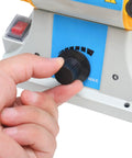 Adjusting speed dial on 4-1/4 Inch Bench Lathe Buffer Polisher With Dual 4 Inch Buffing Wheels, Beefy 320W Variable Speed Benchtop