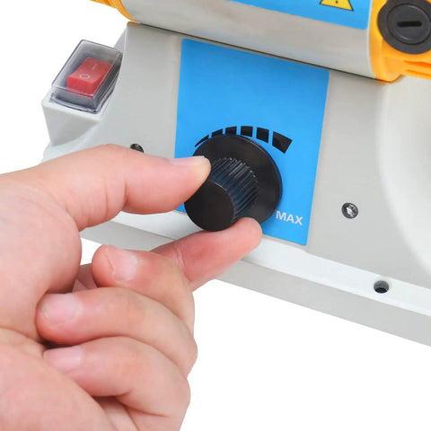 Adjusting speed dial on 4-1/4 Inch Bench Lathe Buffer Polisher With Dual 4 Inch Buffing Wheels, Beefy 320W Variable Speed Benchtop