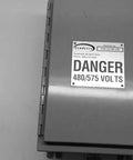 Industrial Control Panel Enclosure 8667 Used Like New Heavy Duty Steel Cabinet 18 by 12 by 9 Inches with voltage warning sign