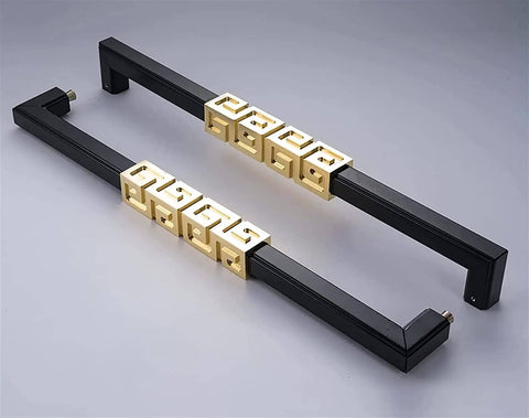 Gold and black double sided sliding barn door handle with geometric design, aluminum construction for wood and glass doors.