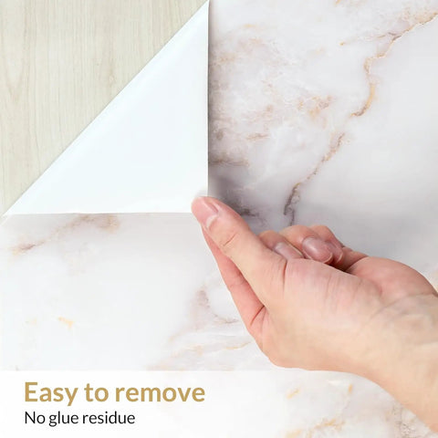 Hand peeling Marble Peel And Stick Countertop Wallpaper 35.4 By 78.7 Inches Waterproof Self Adhesive Roll showing easy removal