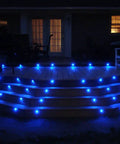Deck illuminated by Low Voltage Blue LED Deck Lights Kit With 20 Waterproof Recessed Lamps, IP67 in-ground outdoor lighting setup.