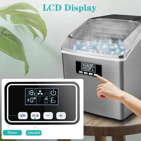 Smooth Operator Home Bar Ice Cube Maker With A Transparent Cover And Brushed Metal Frame, showing LCD controls and ice cubes.