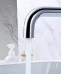 Close-up of Pro Grade Wall Mount Bath Tub Faucet With Extra Long Spout And High Flow Chrome Finish in use, water flowing into tub