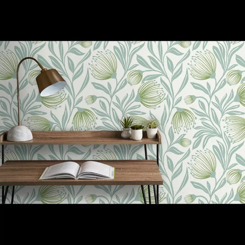 Badass Botanical Modern Vinyl Wallpaper With Smooth Leather Texture Heavy Duty Commercial Wallcovering Custom Printed Just For You For Offices Hotels And Major Event Spaces with light green leaf pattern and wooden shelf.